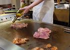 Chef grilling on the teppanyaki griddle